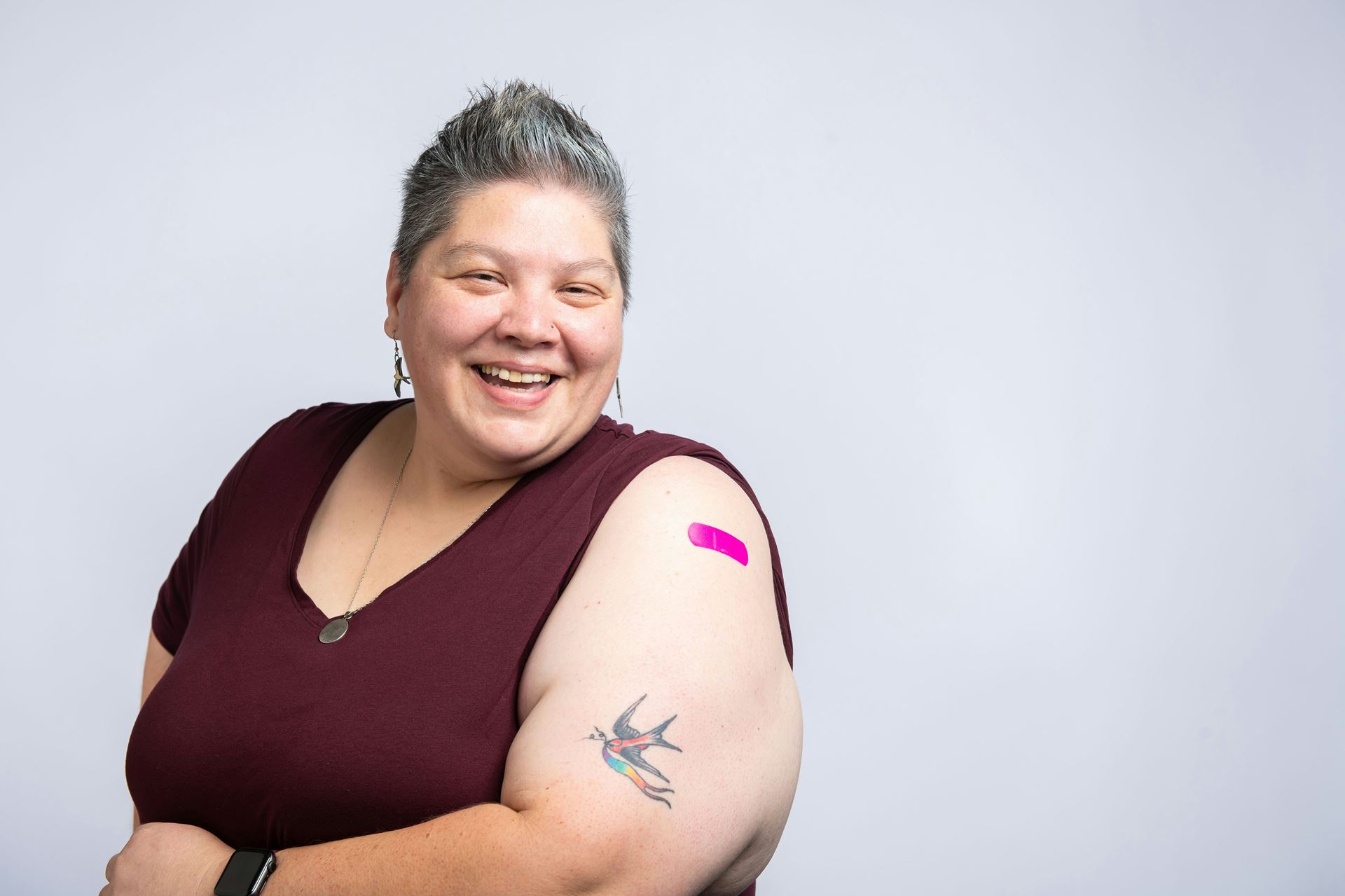 lady with plaster on upper arm